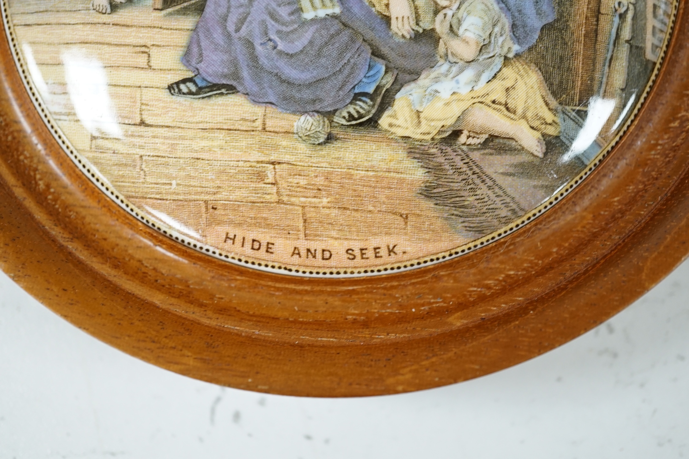 Nine 19th century framed pot lids including ‘Hide and Seek’ and ‘Uncle Toby’ and a jar and cover, largest overall 16cm diameter. Condition - fair to good